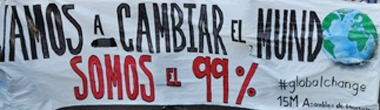 Foto de una pancarta del 15-O en Madrid